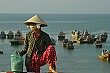 Waiting for a bus in Phan Tiet, a town famous for its fish sauce, Vietnam